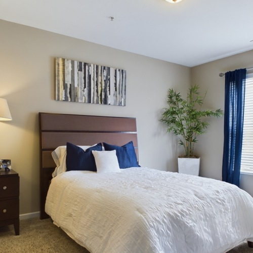 Unwind in your cozy bedroom Bedroom with bed and nightstands